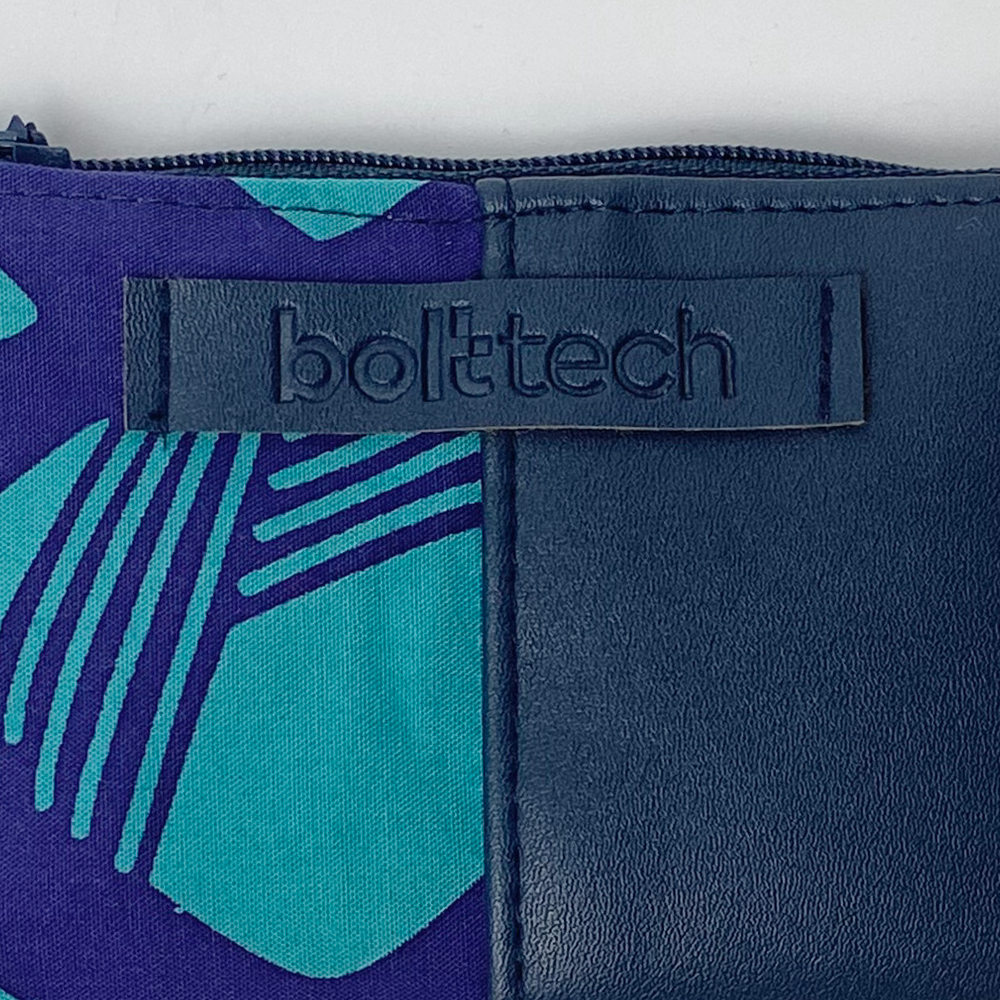 Close-up of a blue and teal pouch with 'bolttech' branding.