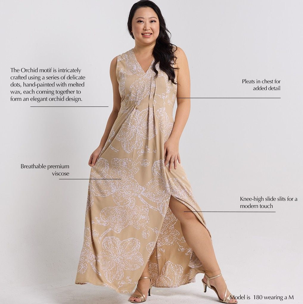 Women posing wearing  tan orchid maxi dress. Photo has description explaining details of the dress 