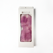 Plum Shibori eye mask by Batik Boutique packaged in white box with viewing window, featuring unique hand-dyed batik pattern.