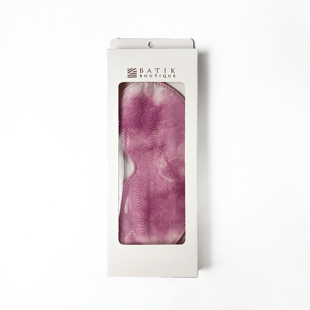Plum Shibori eye mask by Batik Boutique packaged in white box with viewing window, featuring unique hand-dyed batik pattern.