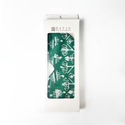 Turquoise Tikar batik eye mask packaged in Batik Boutique white box with viewing window, showcasing handcrafted Malaysian batik design.