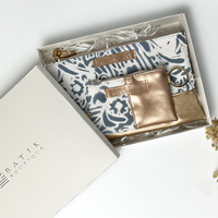 a picture of grey peony batik organizer set in a gift box against a neutral background