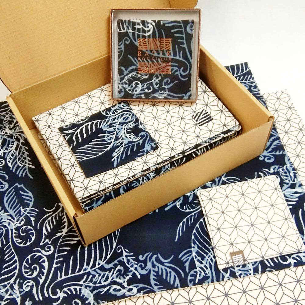 a picture of blue nautical fern batik in a box ready for gifting, against a neutral background
