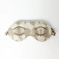 A whitebox photo of batik eye mask in shibori mangosteen