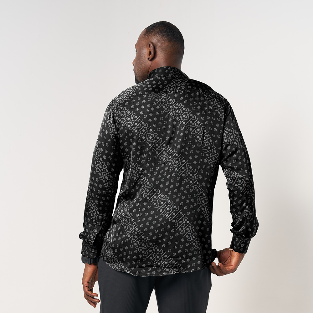 Model wearing the Black Alur batik shirt, showcasing the back design with a tailored slim fit and unique batik pattern.