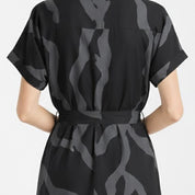 Close up photo of the jet chain ayaz dress 