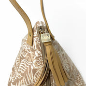 Ketupat Bag in Tan nautical pendant zoomed in 