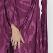 a closeup of batik kimono against a white background in plum rimba