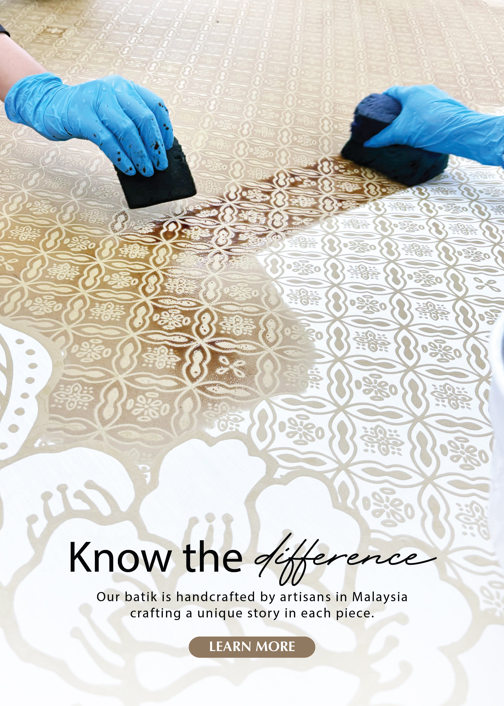 Person applying wax to batik fabric with text about handcrafted batik in Malaysia.