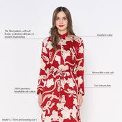 a woman in batik long shirt dress in the pattern ruby fleur