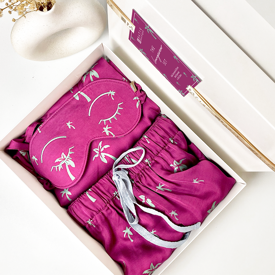 A batik loungewear set in fuchsia palm print. Comes in a white box, exclusive ready for gifting