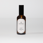 Bottle of Mancosteen perfume on a white background