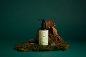 Skincare bottle with pump on a natural background