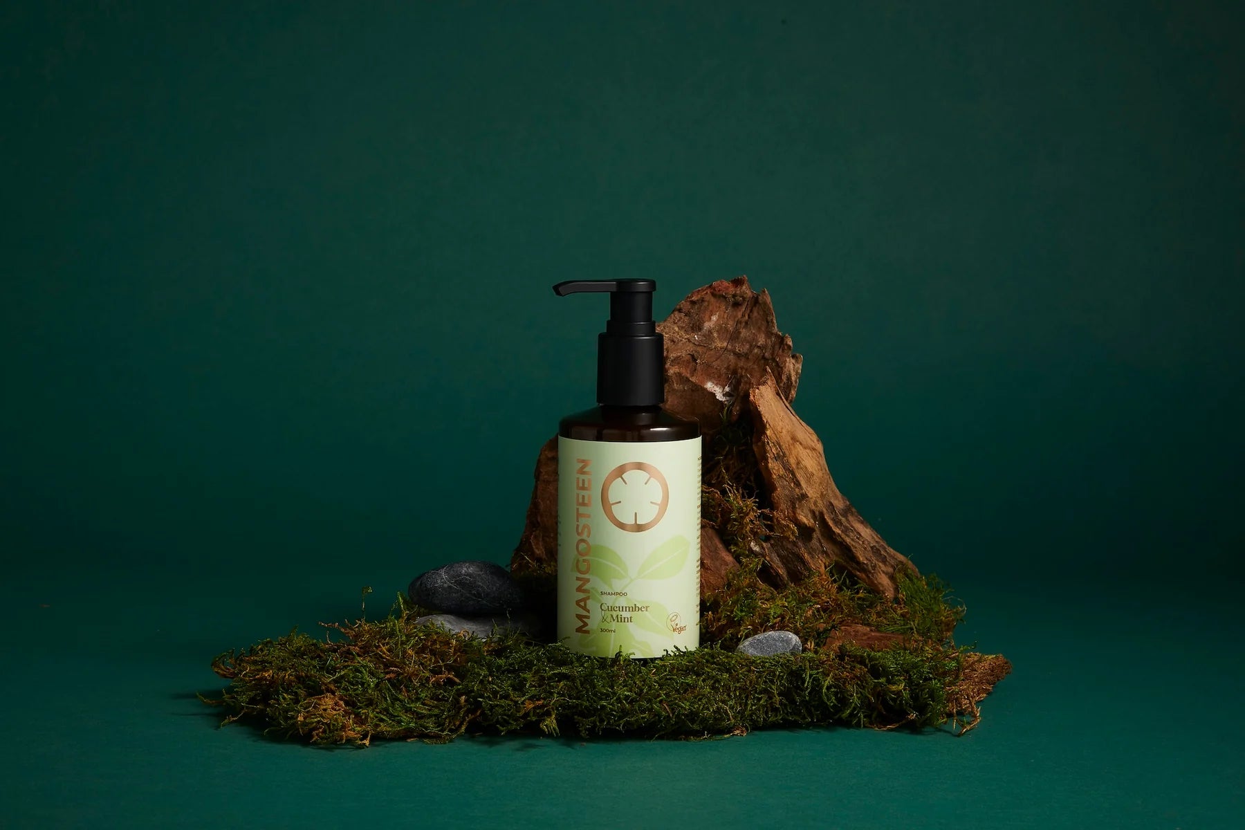 Skincare bottle with pump on a natural background