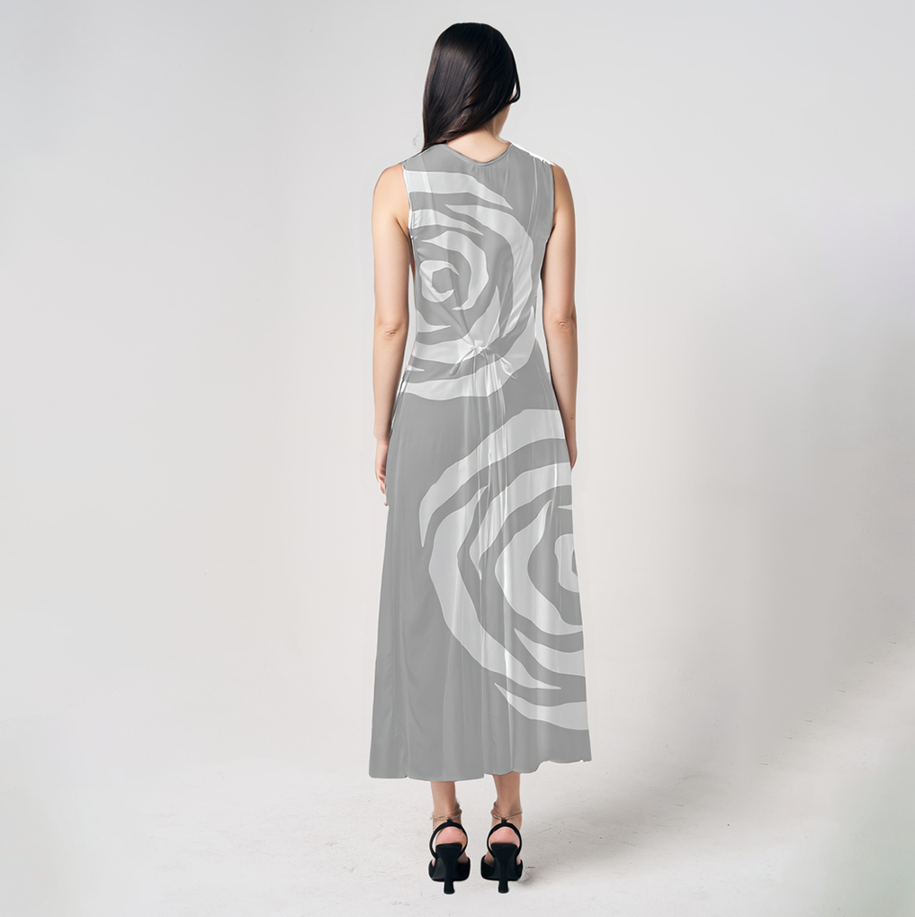 Back view of Batik Boutique’s Silver Rose batik dress featuring abstract rose motifs in silver and white, crafted from soft breathable fabric 