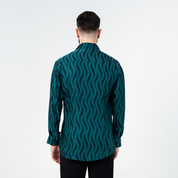 Back view of men's long-sleeved batik shirt in teal Snakeskin print, showcasing the wave-like hand-painted batik pattern.