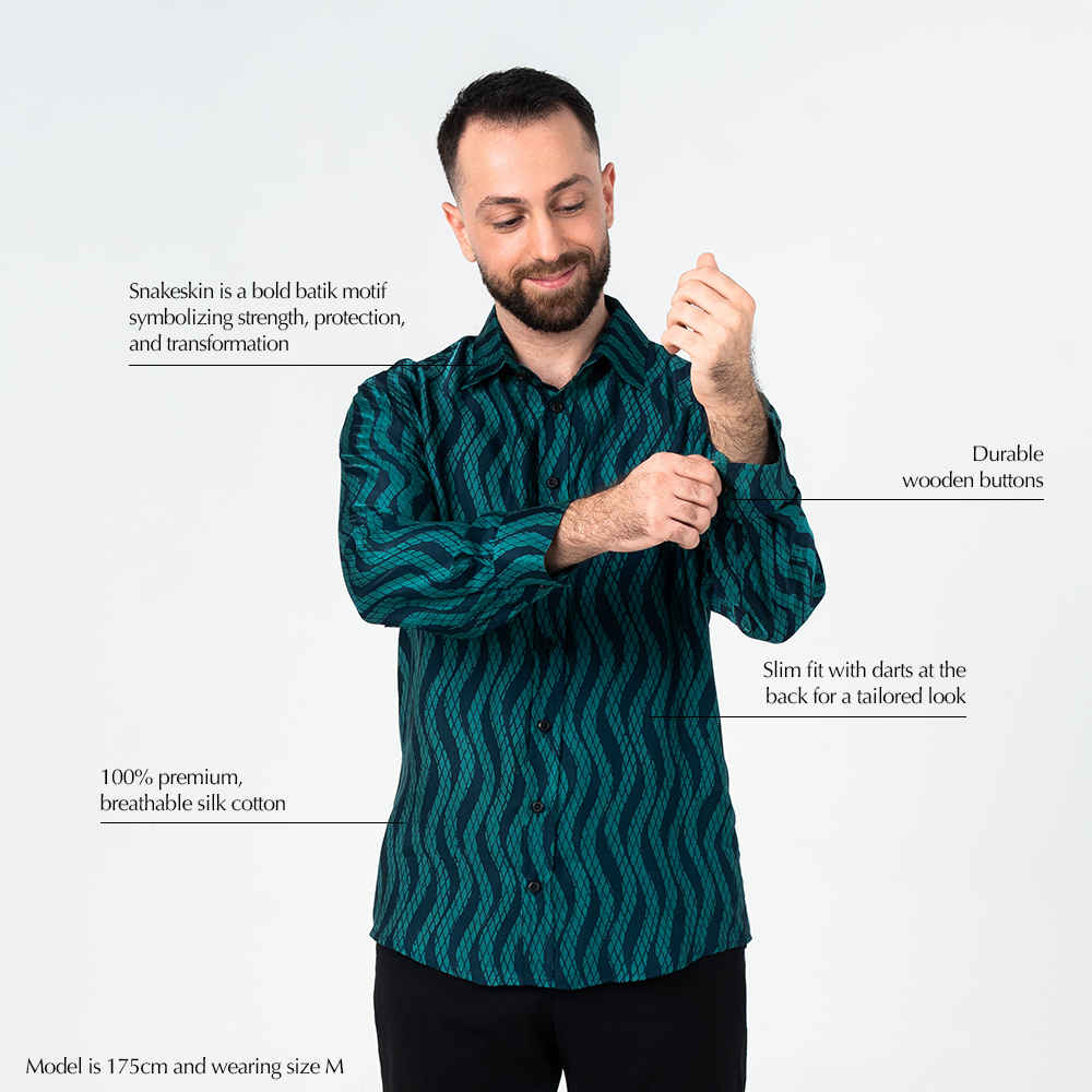 Teal Snakeskin batik shirt with hand-painted motif symbolizing strength and transformation, featuring breathable silk cotton, wooden buttons, and slim tailored fit.