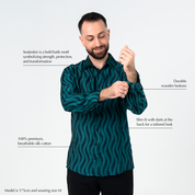 Teal Snakeskin batik shirt with hand-painted motif symbolizing strength and transformation, featuring breathable silk cotton, wooden buttons, and slim tailored fit.