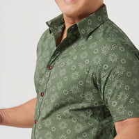 a close up photo of men shirt in olive Bintang pattern