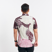 back view of the Maroon Petola batik shirt, highlighting modern fit and intricate batik motifs