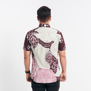 back view of the Maroon Petola batik shirt, highlighting modern fit and intricate batik motifs