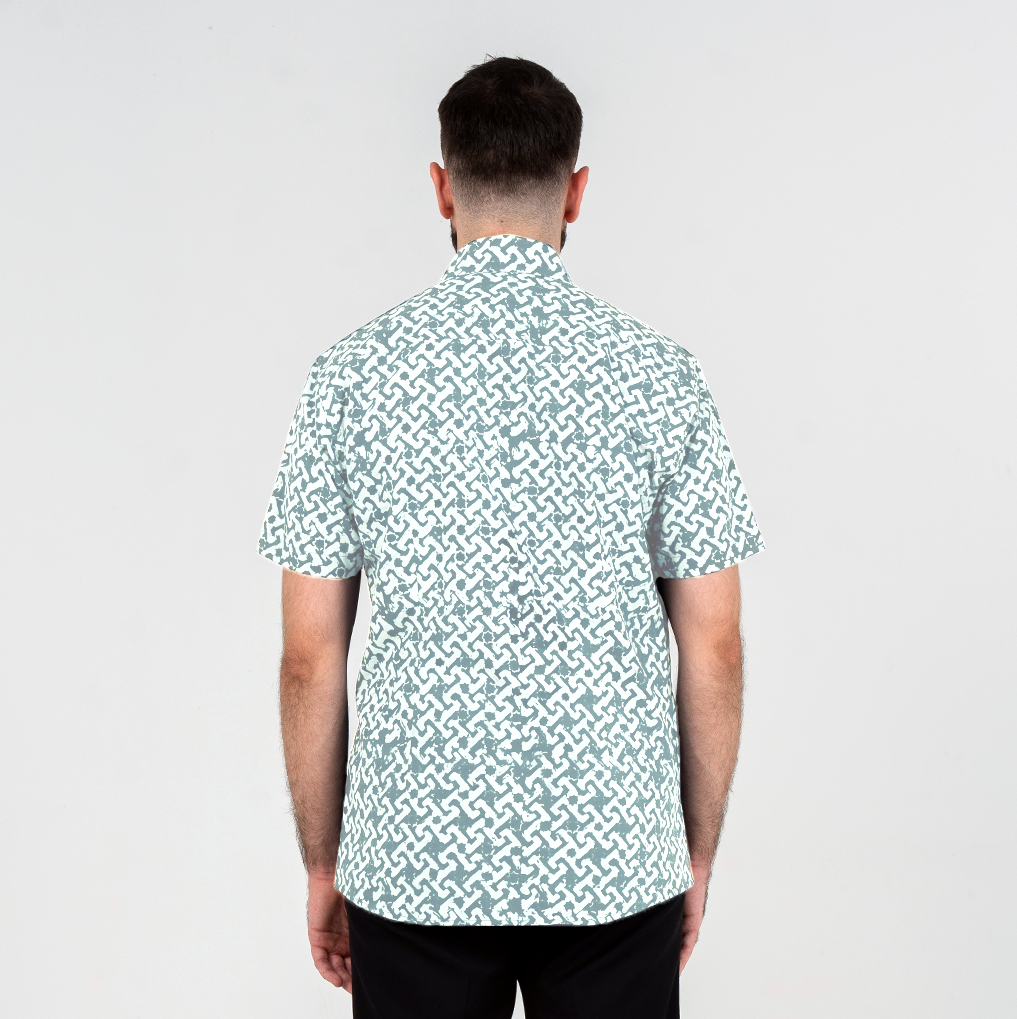 Back view of teal Arabesque batik shirt showing modern cut.