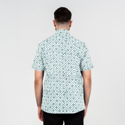 Back view of teal Arabesque batik shirt showing modern cut.