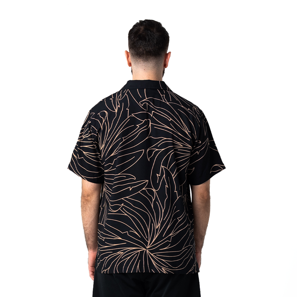 Back view of men’s Onyx Palma Cuban shirt in black with hand-drawn batik leaf motifs.