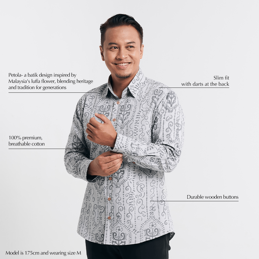  Studio shot with text overlays highlighting the features of long sleeved batik shirt