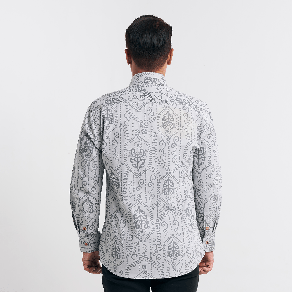 Back view displaying the seamless batik motifs and tailored cut