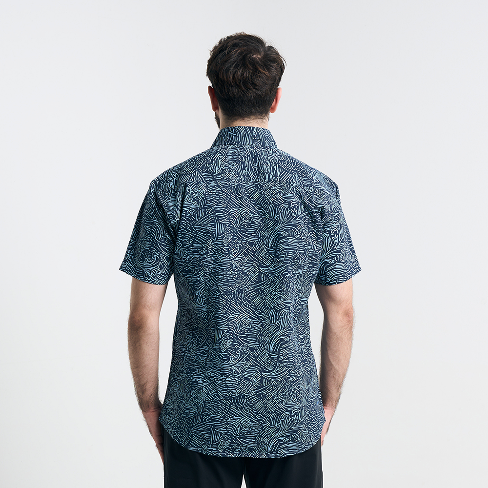 Back view displaying the seamless batik motifs and tailored cut