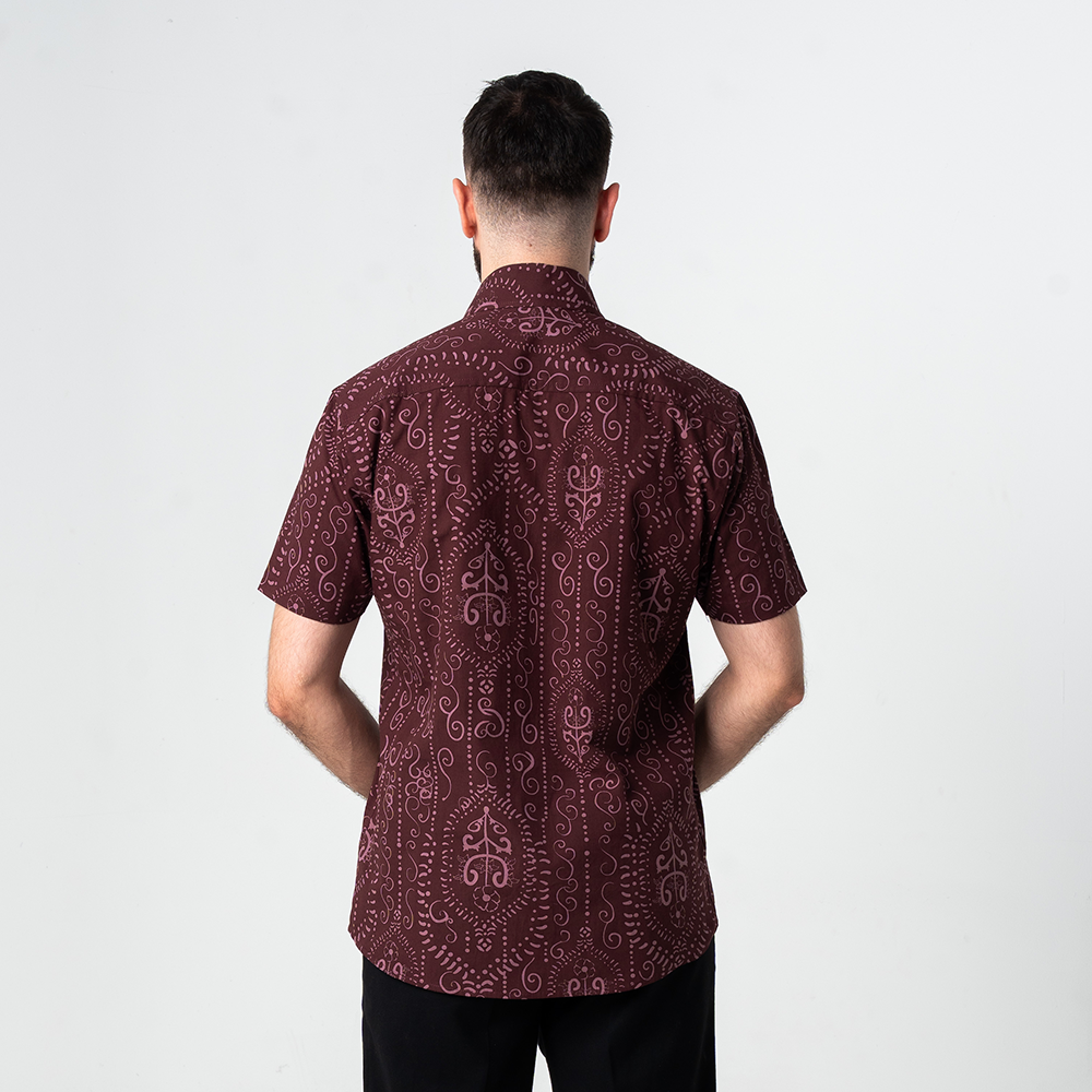 Back view of men's short-sleeved batik shirt in Garnet Petola print, showcasing heritage-inspired Malaysian design in breathable cotton