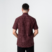 Back view of men's short-sleeved batik shirt in Garnet Petola print, showcasing heritage-inspired Malaysian design in breathable cotton