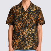 Man wearing black and orange printed shirt, closeup