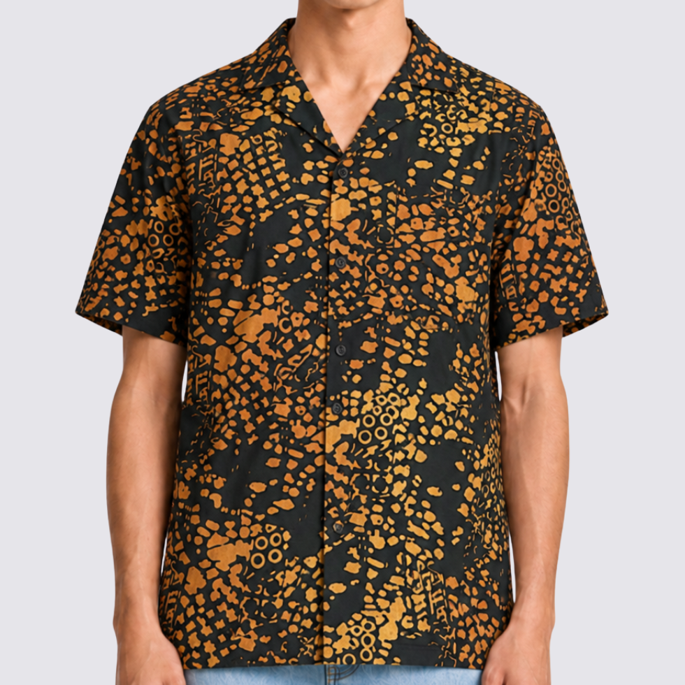 Man wearing black and orange printed shirt, closeup