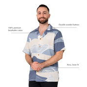 Man wearing lavender printed batik shirt, with annotated details by the sides