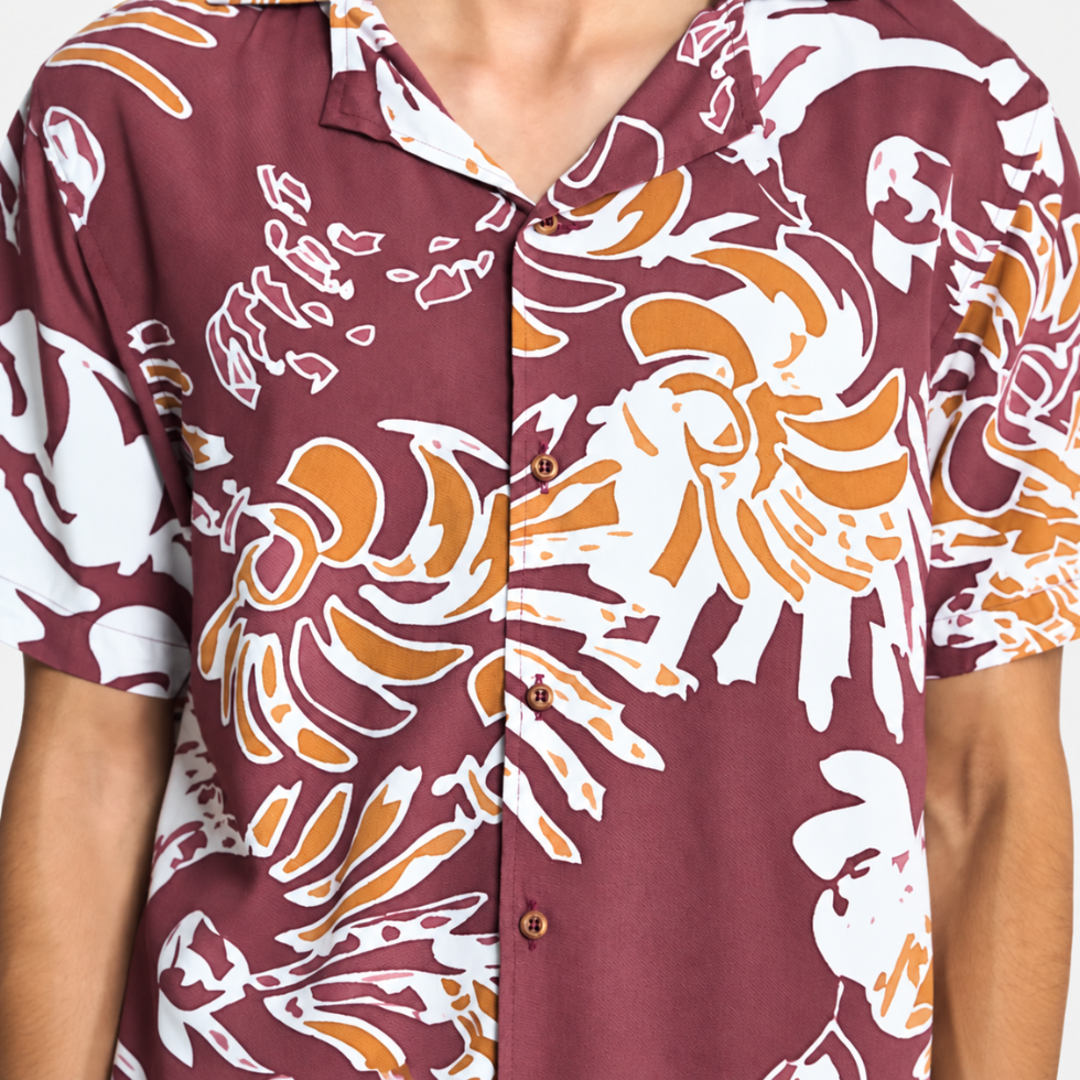Closeup of man wearing maroon shirt