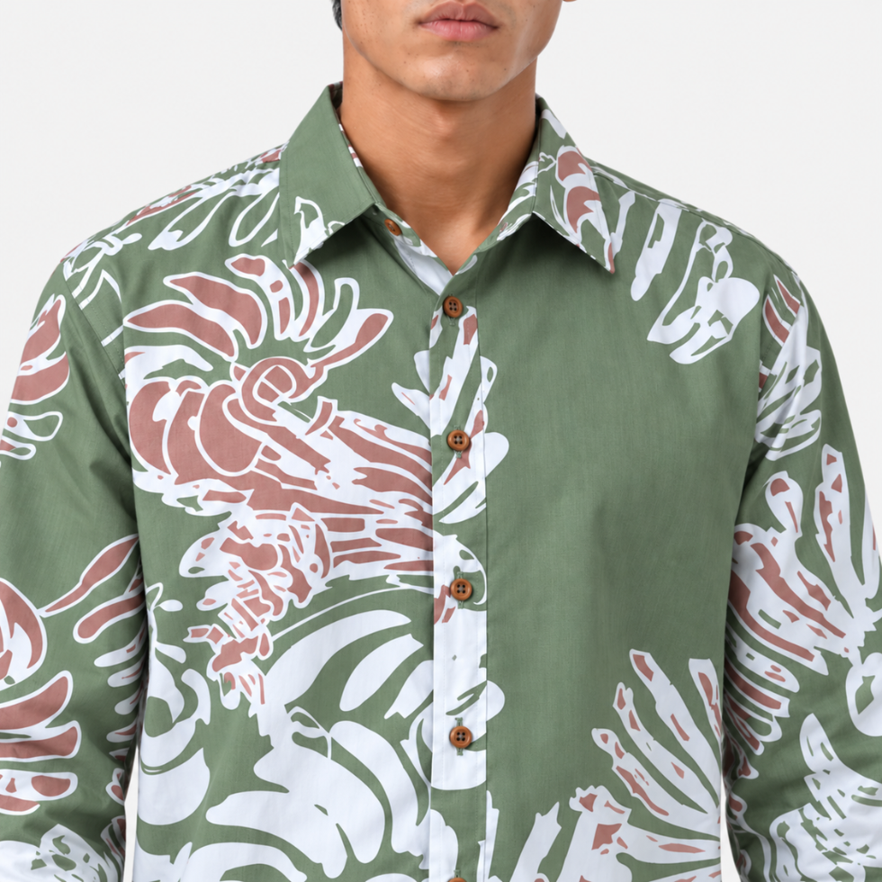 Close-up of a button-front shirt with an abstract reef pattern in green