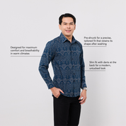 Man wearing a blue patterned shirt on a white background with text about the shirt's features.