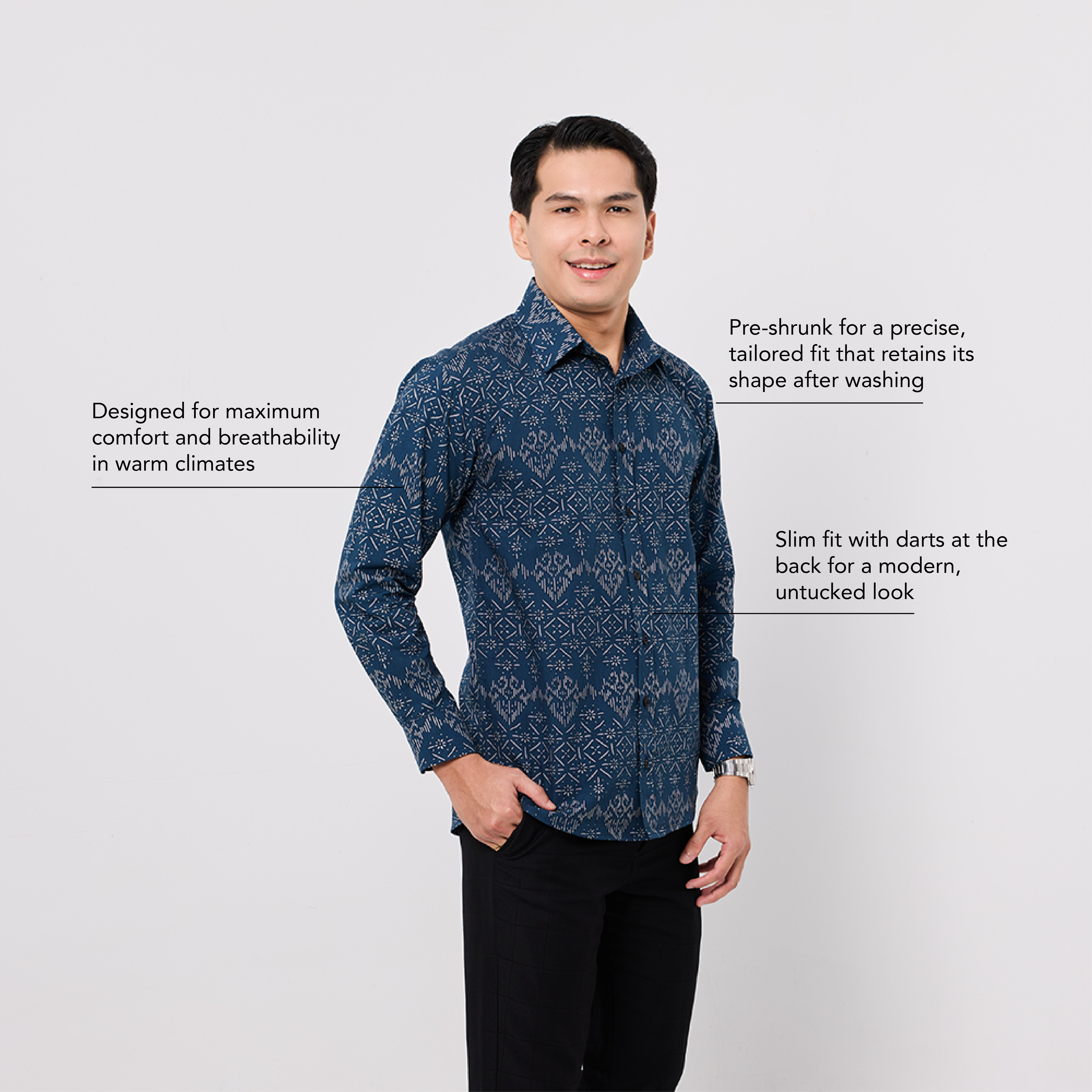 Man wearing a blue patterned shirt on a white background with text about the shirt's features.