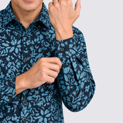 Closeup of man wearing blue printed batik shirt