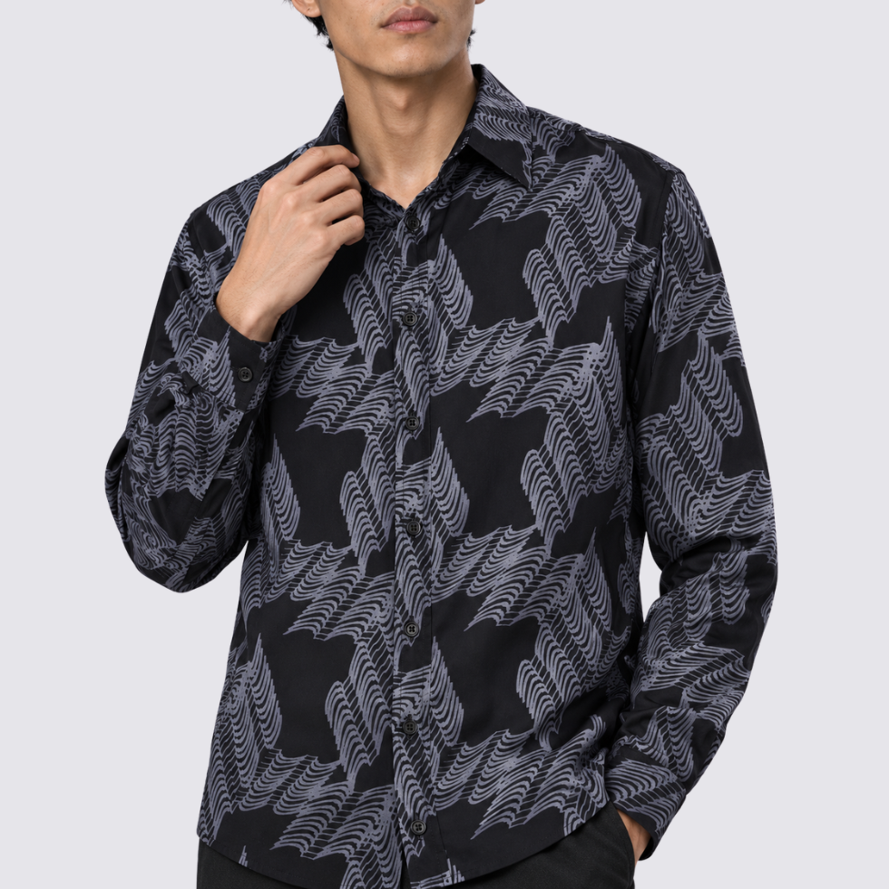 Closeup of black printed batik shirt