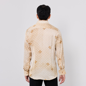 Man wearing a beige shirt on a white background