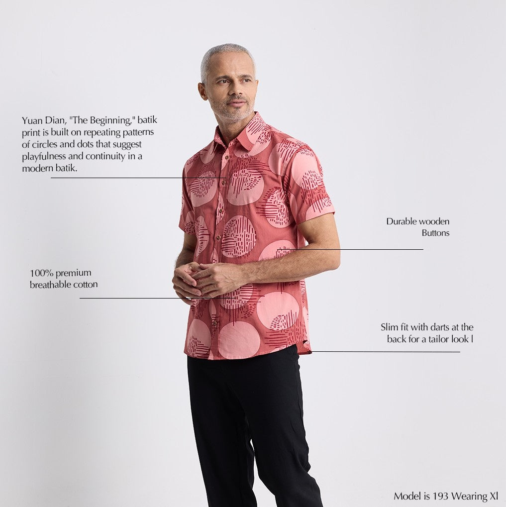 Man wearing Crimson Yuan Dian short sleeved shirt with a description of the unique qualities 