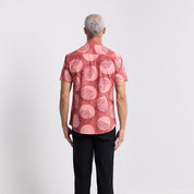 Man wearing Crimson Yuan Dian short sleeved shirt back facing photo