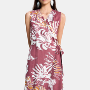 A sleeveless wrap-style dress with a V-neckline and self-tie waist, featuring an abstract white and light maroon pattern, shown on a model against a light gray background.