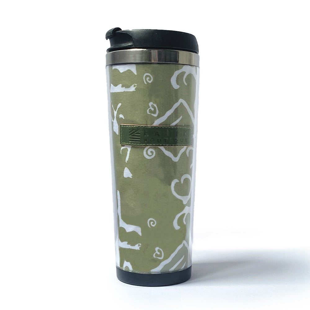 a batik tumbler with the olive diwanie pattern on it on a white surface