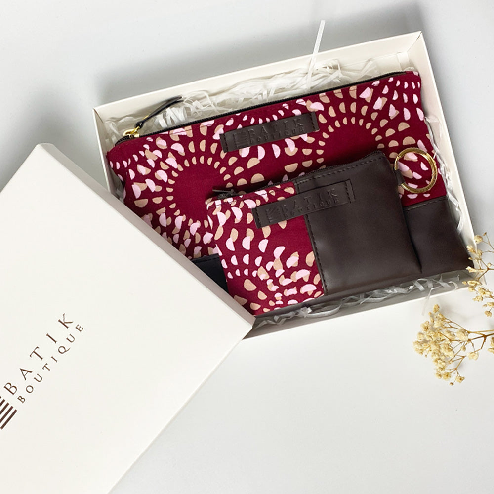 a lifestyle photo of organizer set in crimson lunar pattern ina white bo ready for gifting. 