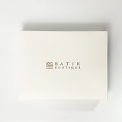 White box with 'Batik Boutique' logo on a light gray background