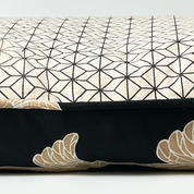 batik cover in black coconut against a white background